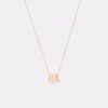 Halsband med upprepade C-formade rondeller