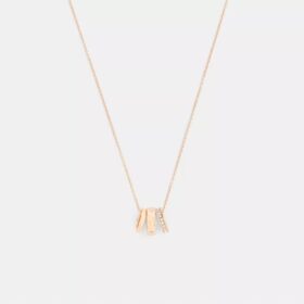 Halsband med upprepade C-formade rondeller