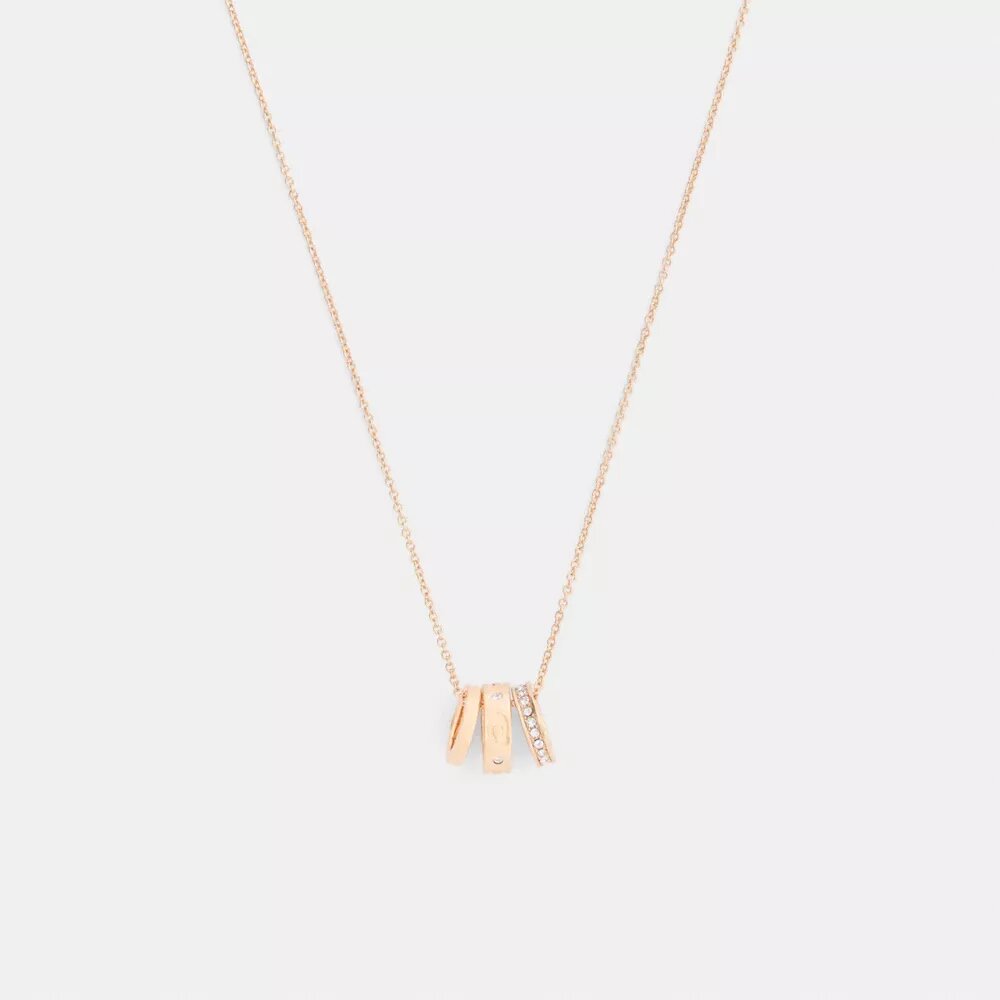 Halsband med upprepade C-formade rondeller