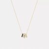 Halsband med upprepade C-formade rondeller
