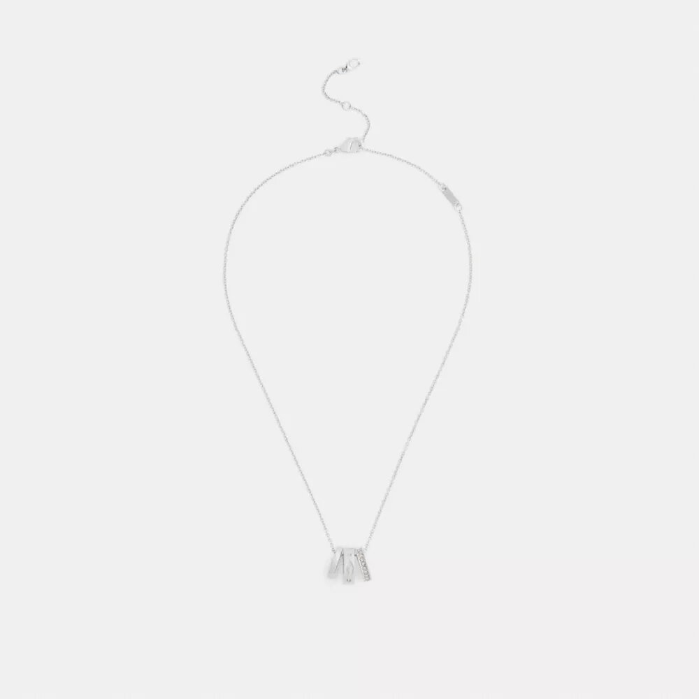 Halsband med upprepade C-formade rondeller