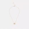 Halsband med upprepade C-formade rondeller