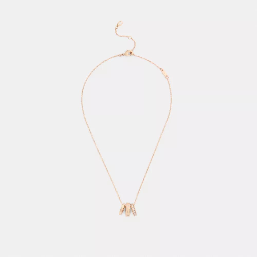 Halsband med upprepade C-formade rondeller