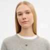 Halsband med upprepade C-formade rondeller