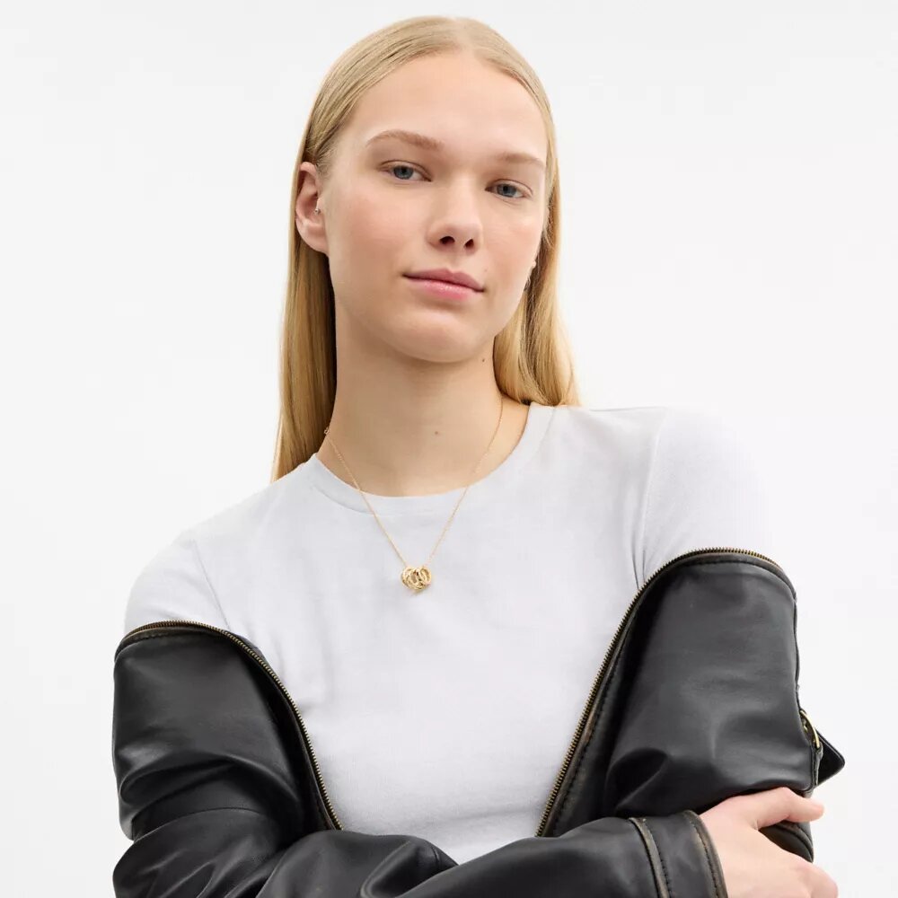 Halsband med upprepade C-formade rondeller