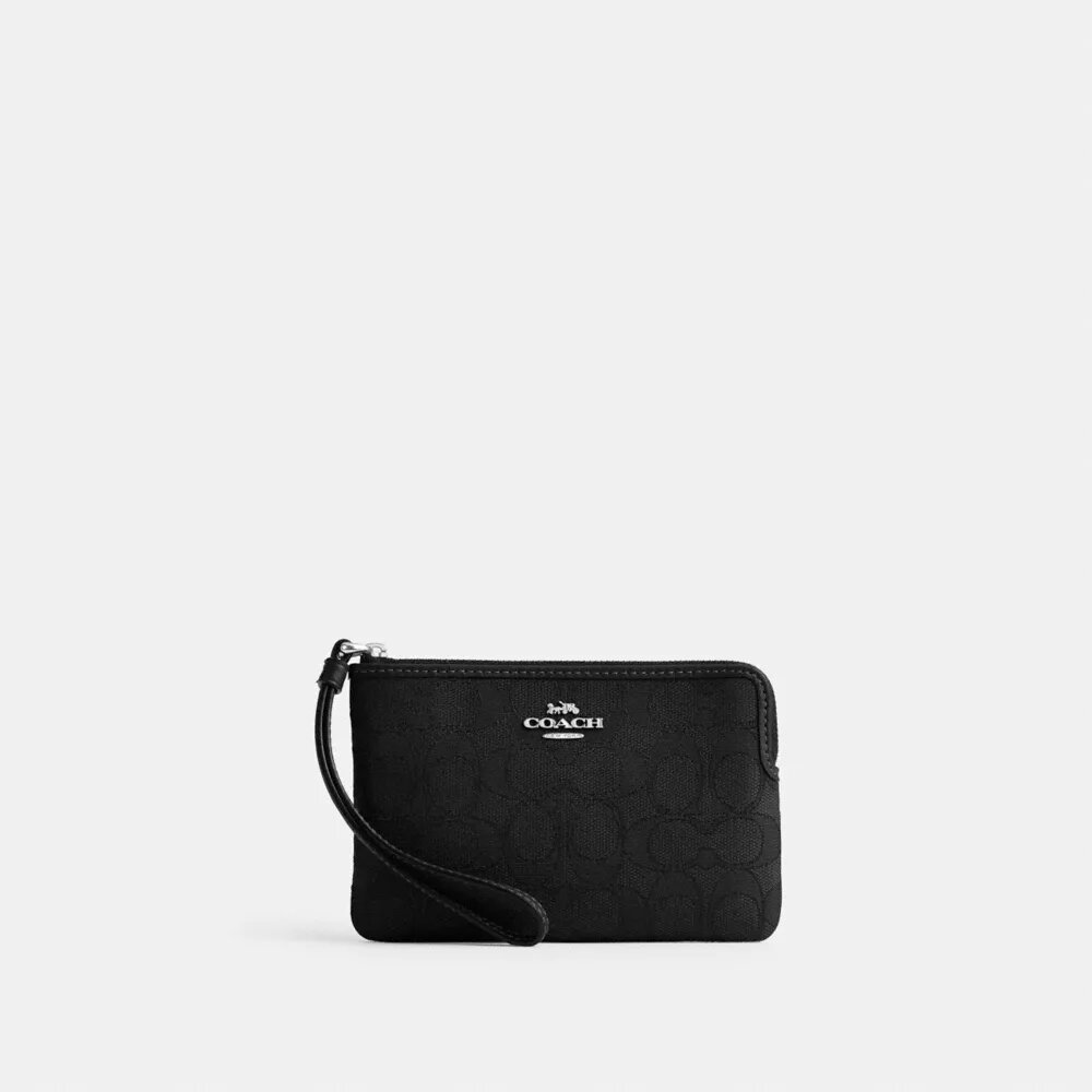 Handlovsväskor med hörnficka och dragkedja i Signature-jacquard