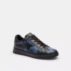 Höga sneakers i vårt Signature Canvas med kamouflage-tryck