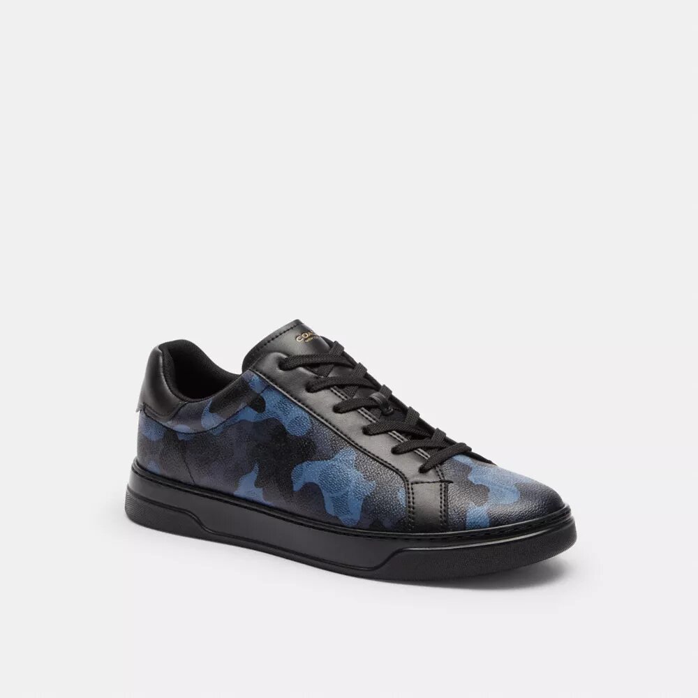 Höga sneakers i vårt Signature Canvas med kamouflage-tryck