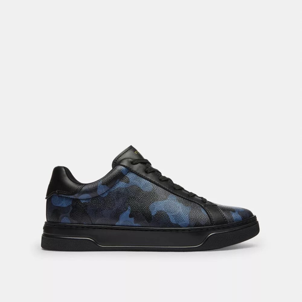 Höga sneakers i vårt Signature Canvas med kamouflage-tryck