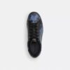 Höga sneakers i vårt Signature Canvas med kamouflage-tryck