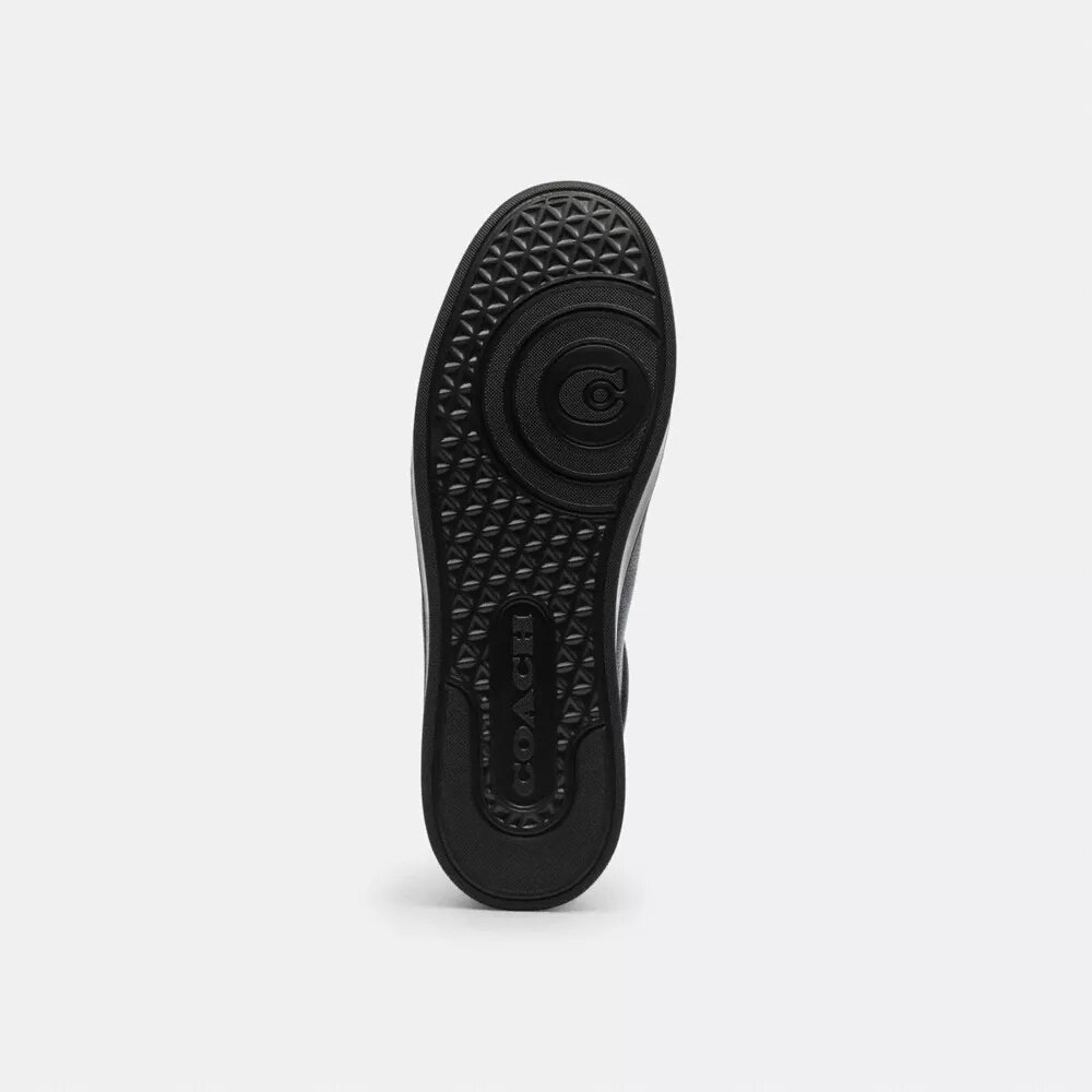 Höga sneakers i vårt Signature Canvas med kamouflage-tryck