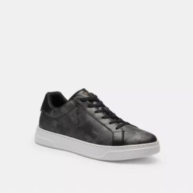 Höga sneakers i vårt signaturmönster i kamouflage