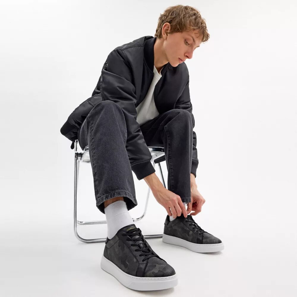 Höga sneakers i vårt signaturmönster i kamouflage