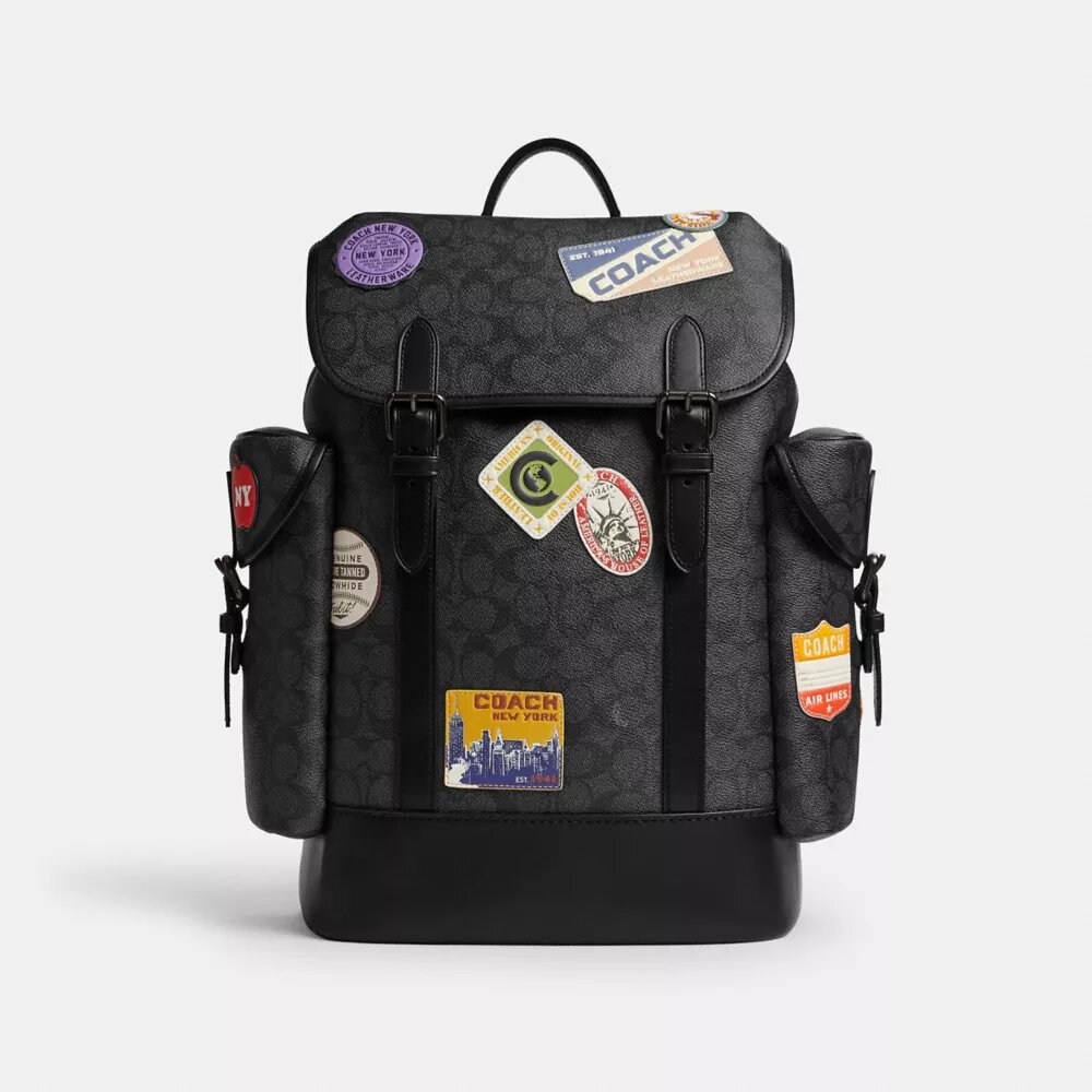 Hitch-ryggsäck i Signature Canvas med lappar