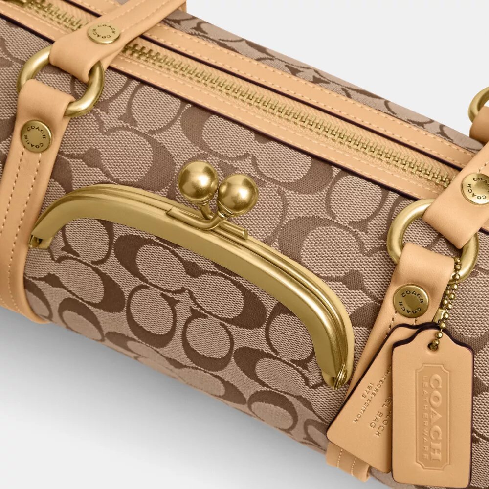Kisslock Barrel Bag 28 i Signature Jacquard