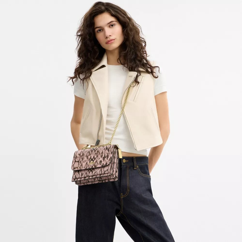 Klare axelremsväskor