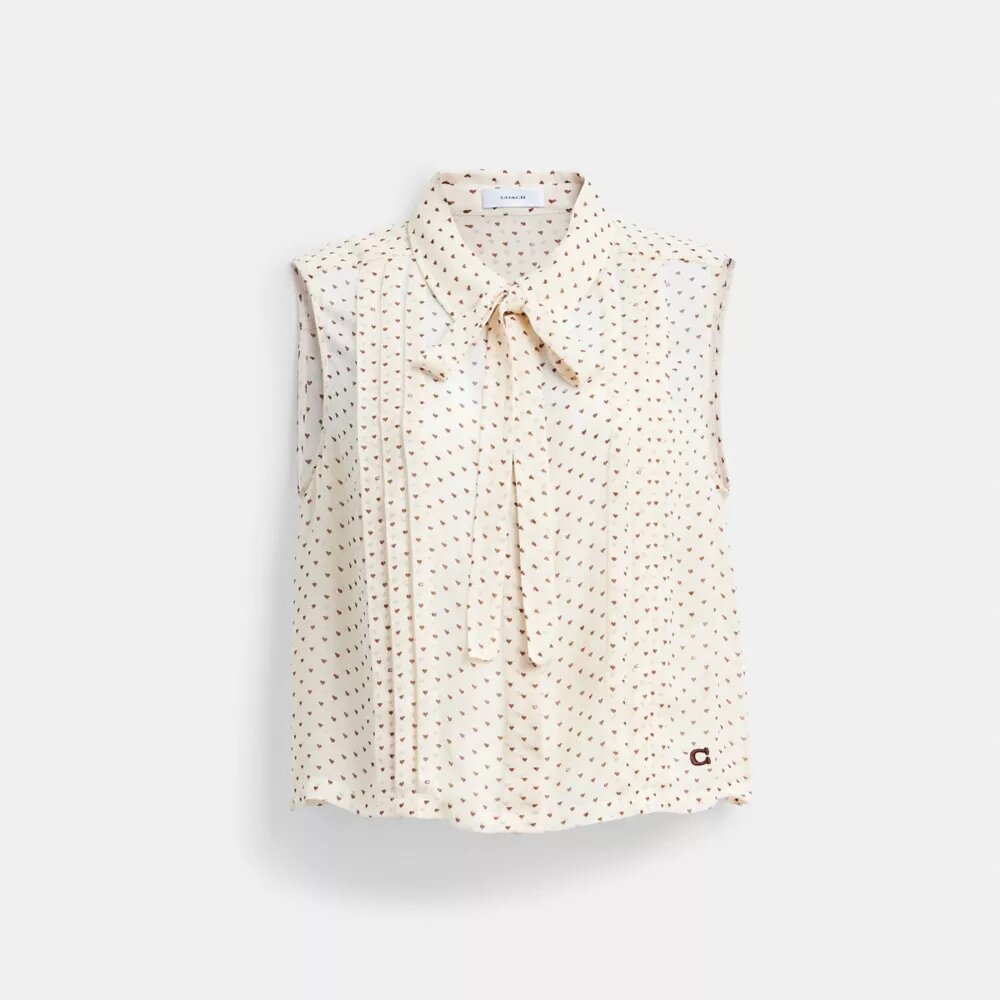 Kort ärmlös blus