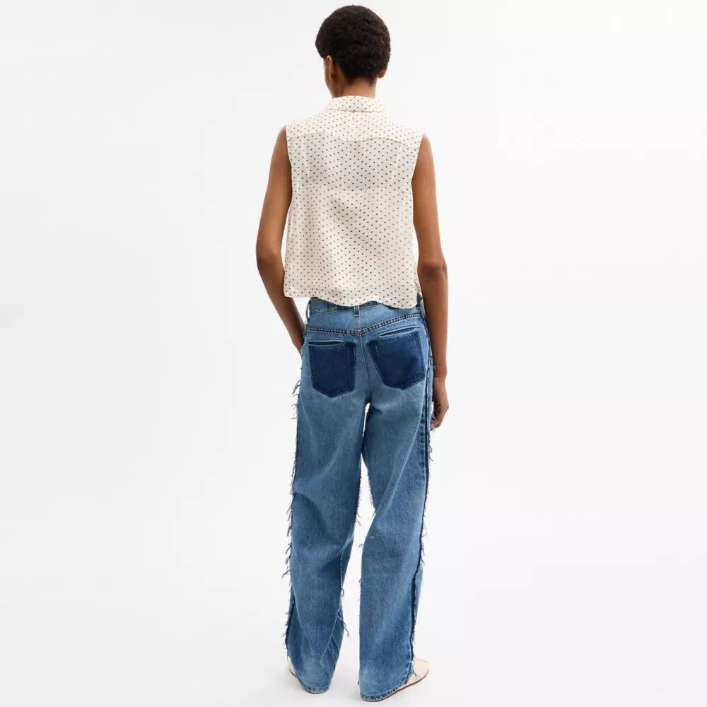 Kort ärmlös blus
