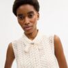 Kort ärmlös blus