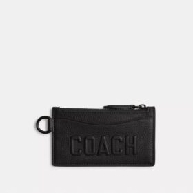 Kortfodral med dragkedja och Coach-grafik