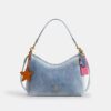 Laurel axelremsväskor i Loved Denim med smycken