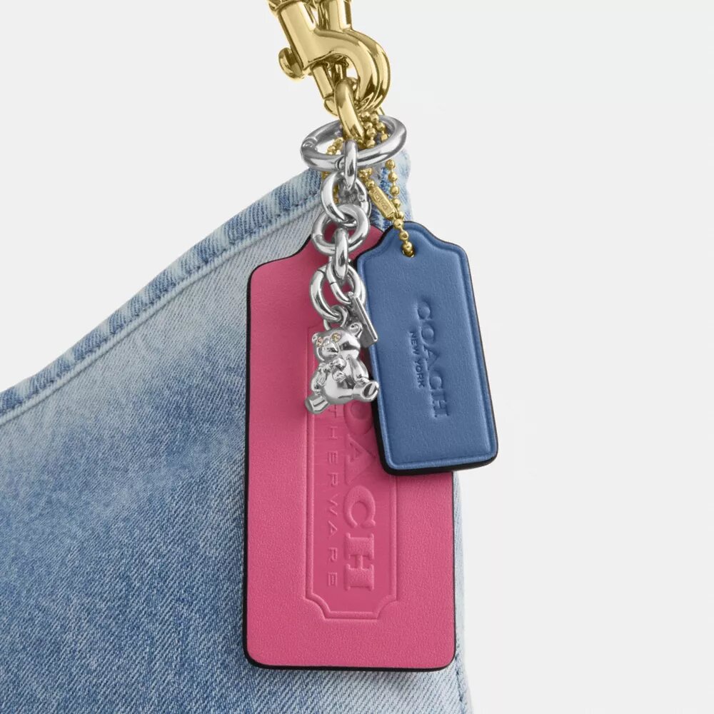 Laurel axelremsväskor i Loved Denim med smycken
