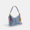 Laurel axelremsväskor i Loved Denim med smycken
