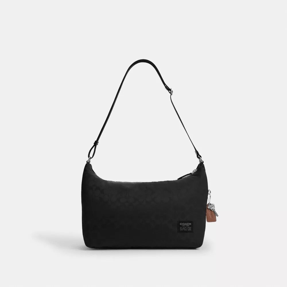 Leo Crossbody i signaturnylon