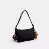 Leo Crossbody i signaturNylon med smycken