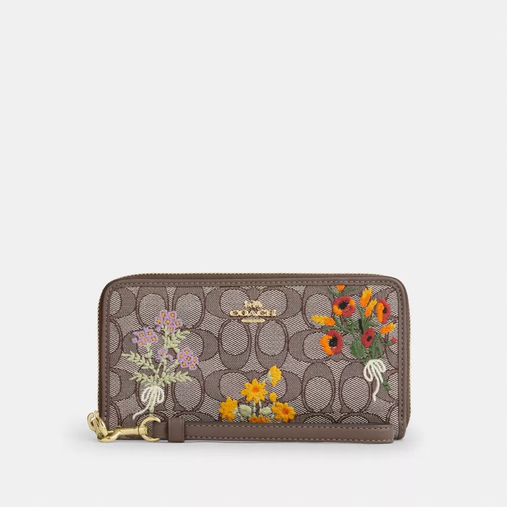 Lång plånbok med dragkedja runt om i Signature-jacquard med blommig brodyr