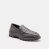 Loafers med signaturmönster
