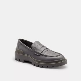 Loafers med signaturmönster