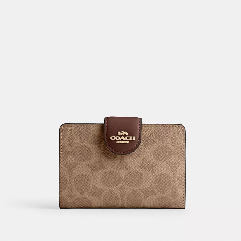 Medelstor hörnplånbok med dragkedja i Signature Canvas
