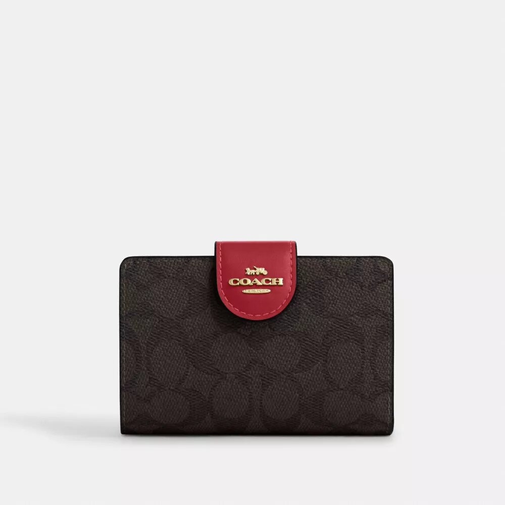 Medelstor hörnplånbok med dragkedja i Signature Canvas