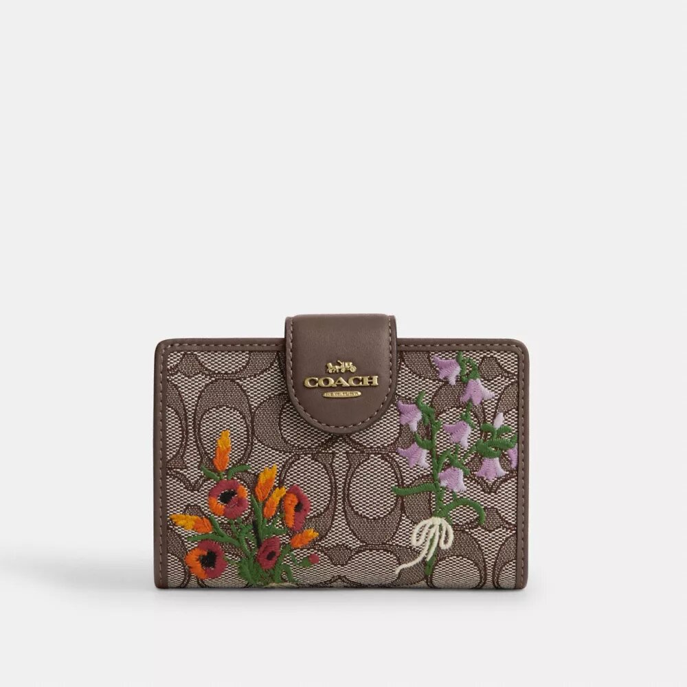 Medium hörnplånbok med dragkedja i signaturjacquard med blommig broderi