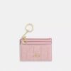 Mini Skinny ID-fodral i Loved Denim med quiltning och smycken