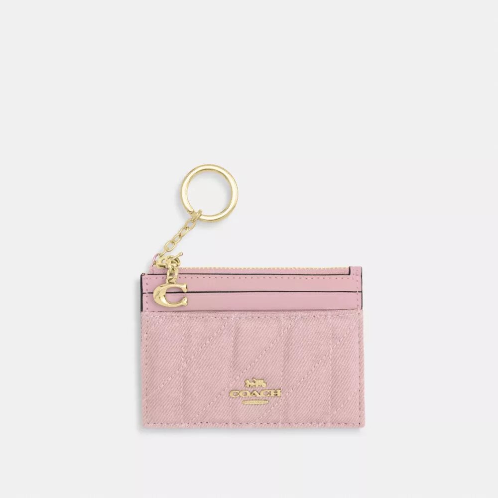 Mini Skinny ID-fodral i Loved Denim med quiltning och smycken