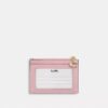 Mini Skinny ID-fodral i Loved Denim med quiltning och smycken