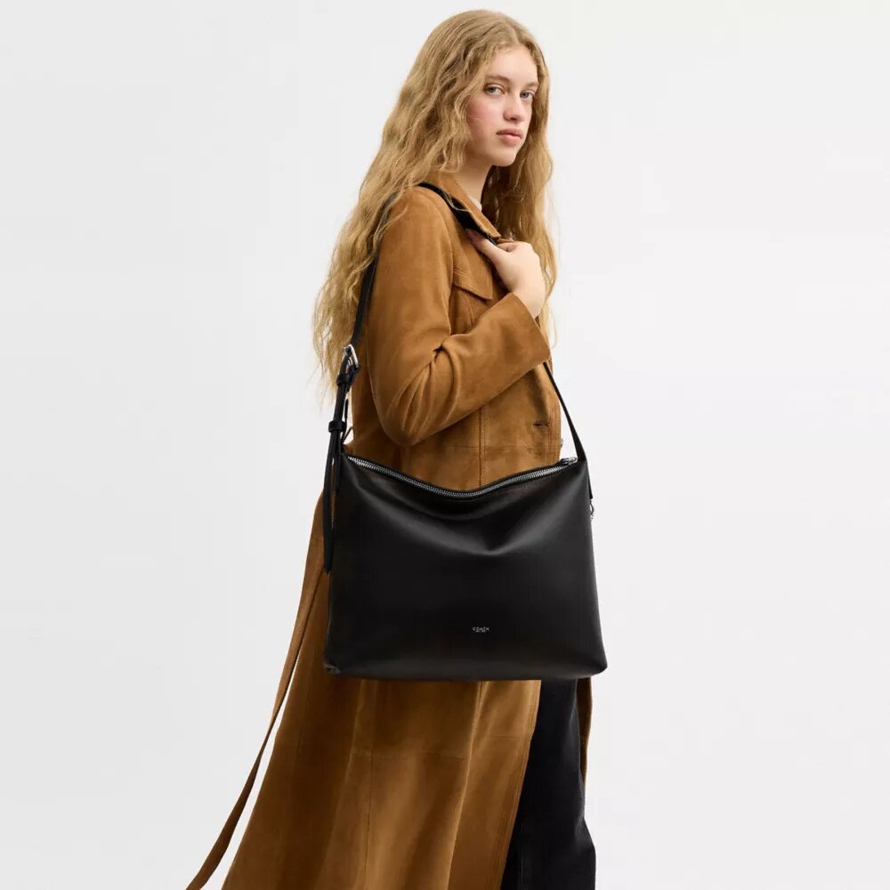 Mott Messenger-väska 38 i slitet läder
