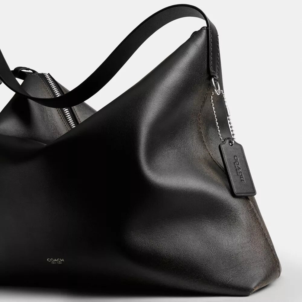 Mott Messenger-väska 38 i slitet läder