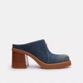 Mules med klack och skulpterad C-logotyp i Loved Denim
