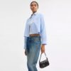 Nolita 19 med glittrande fjärilsmönster