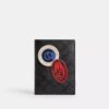 Passfodral i Signature Canvas med patchar