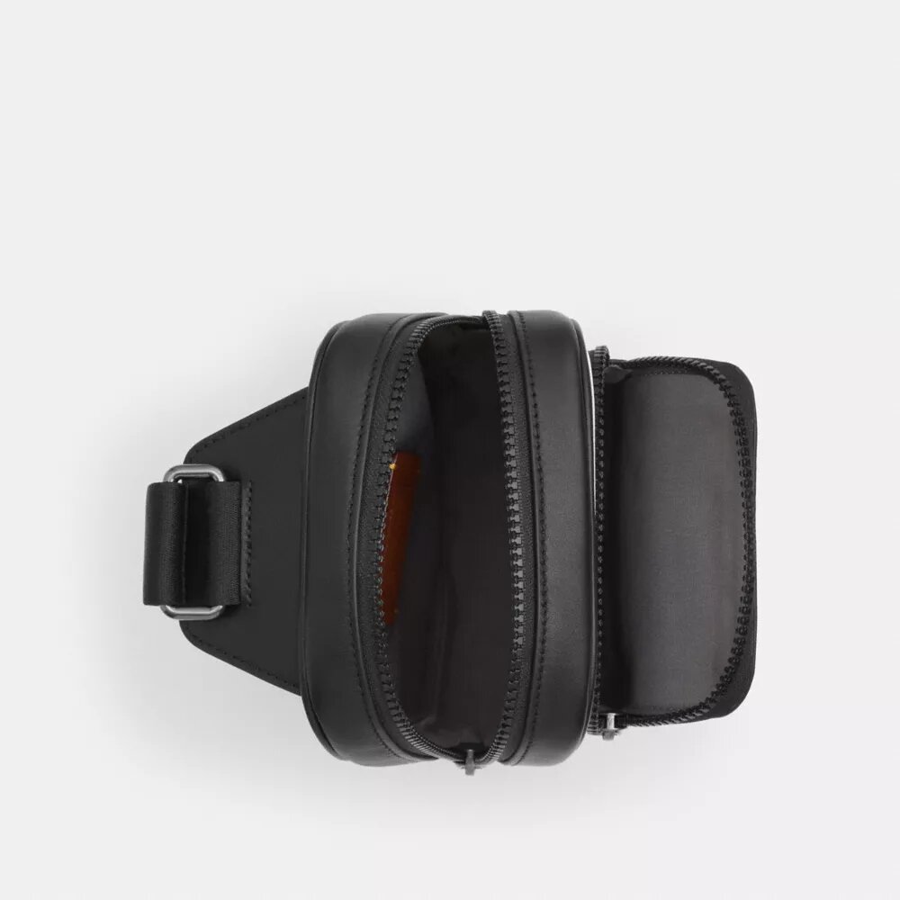 Racer Sling Pack i Signature Canvas