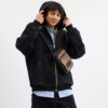 Racer Sling Pack i Signature Canvas