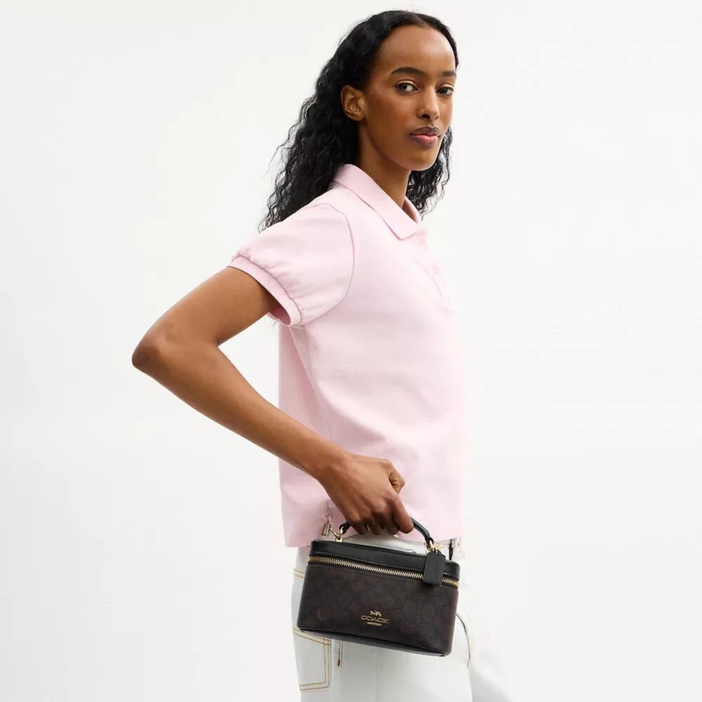 Rainer crossbody-väska 18 i Signature Canvas
