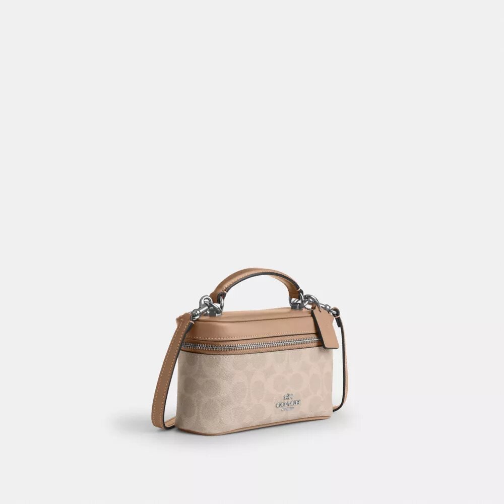 Rainer crossbody-väska 18 i Signature Canvas