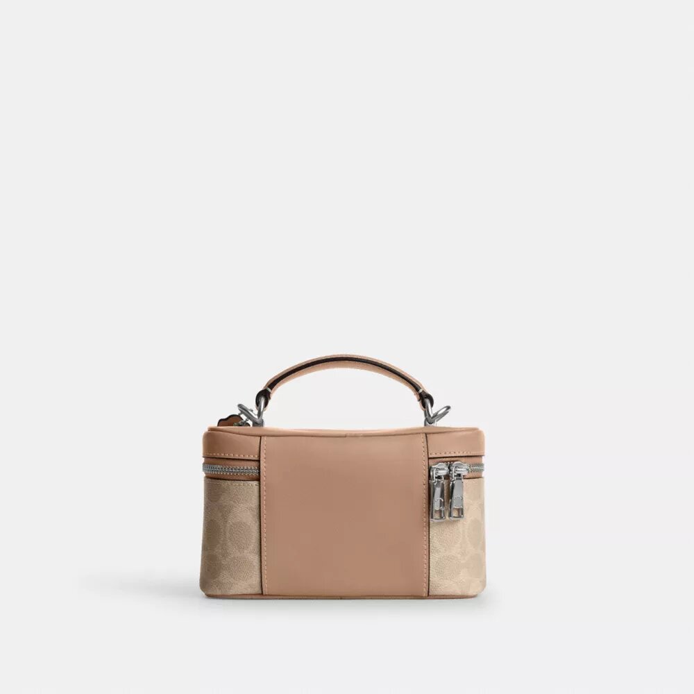 Rainer crossbody-väska 18 i Signature Canvas