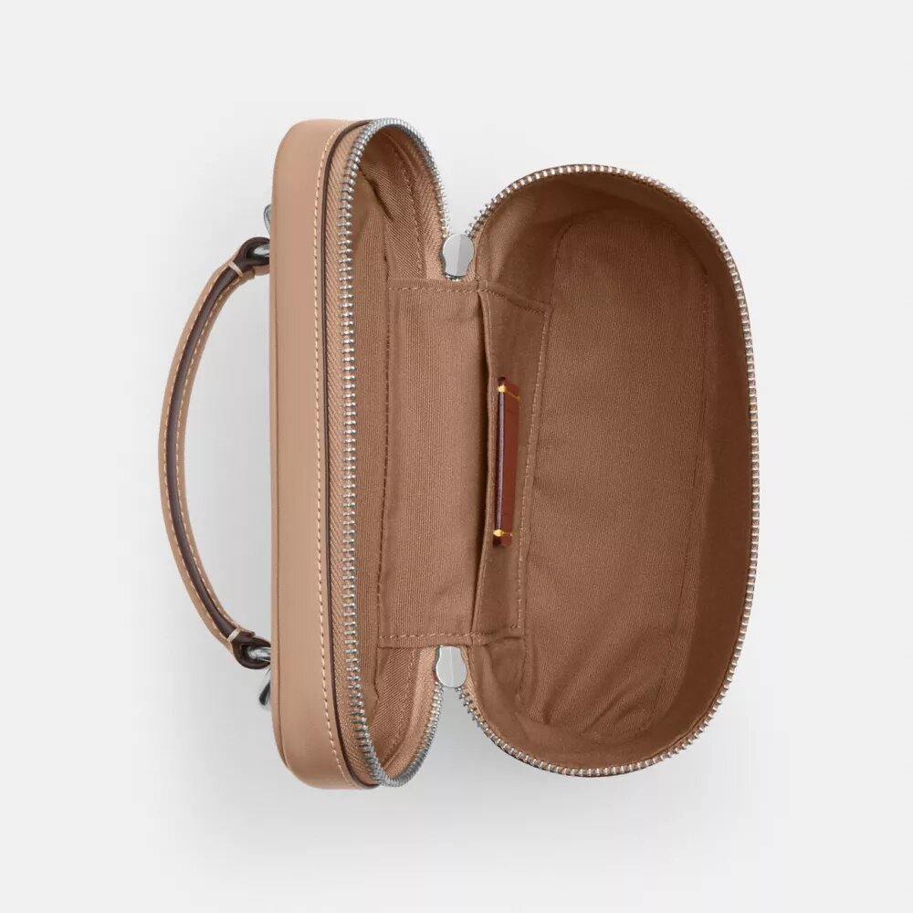 Rainer crossbody-väska 18 i Signature Canvas