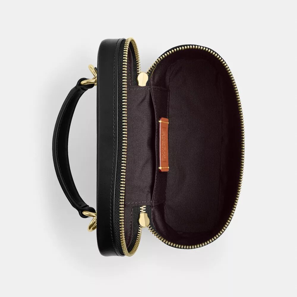 Rainer crossbody-väska 18 i Signature Canvas